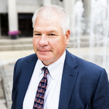 Former teacher calling for spending cuts, deregulation runs as Democrat